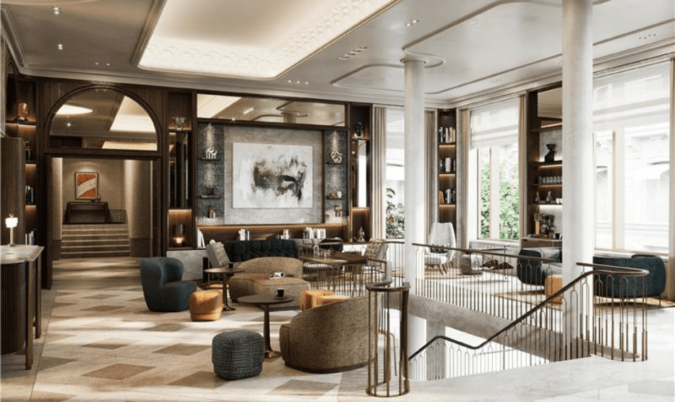 news_RosewoodMUC Luxurious hotel lobby featuring modern seating arrangements, elegant decor, and large windows providing natural light, creating a welcoming atmosphere for guests.